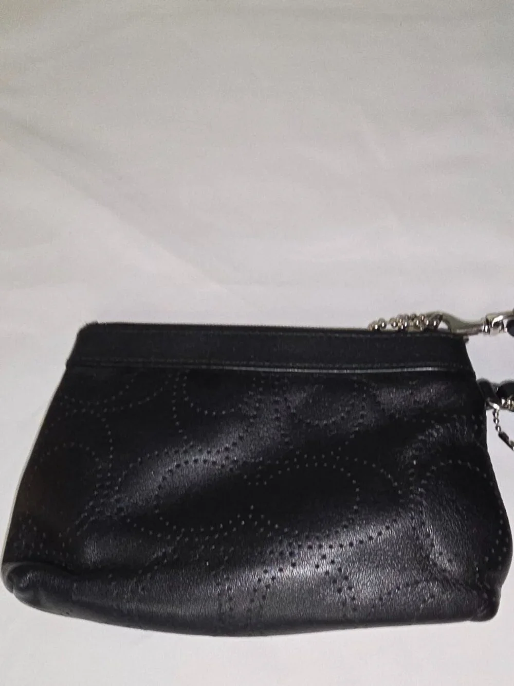 Coach signature perforated